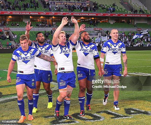Bulldogs players celebrate after their win during the NRL 2nd Elimination Final match between the Melbourne Storm and the Canterbury Bankstown...