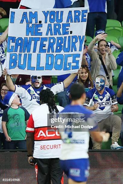 Bulldogs fans celebrate their win during the NRL 2nd Elimination Final match between the Melbourne Storm and the Canterbury Bankstown Bulldogs at...