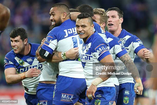 Bulldogs players celebrate a try during the NRL 2nd Elimination Final match between the Melbourne Storm and the Canterbury Bankstown Bulldogs at AAMI...