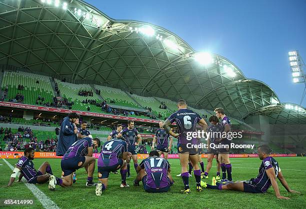 Cameron Smith of the Storm talks to his players after losing the NRL 2nd Elimination Final match between the Melbourne Storm and the Canterbury...