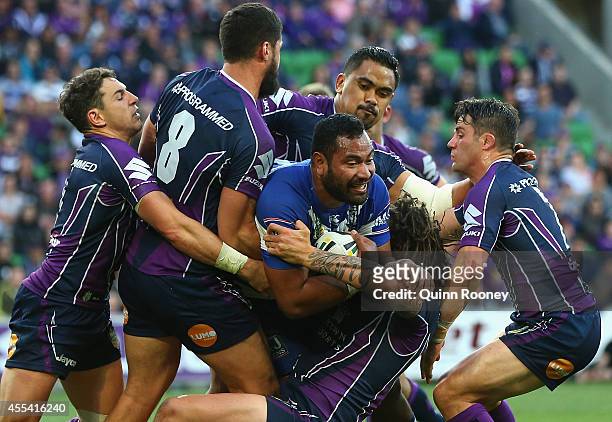 Tony Williams of the Bulldogs is tackled during the NRL 2nd Elimination Final match between the Melbourne Storm and the Canterbury Bankstown Bulldogs...