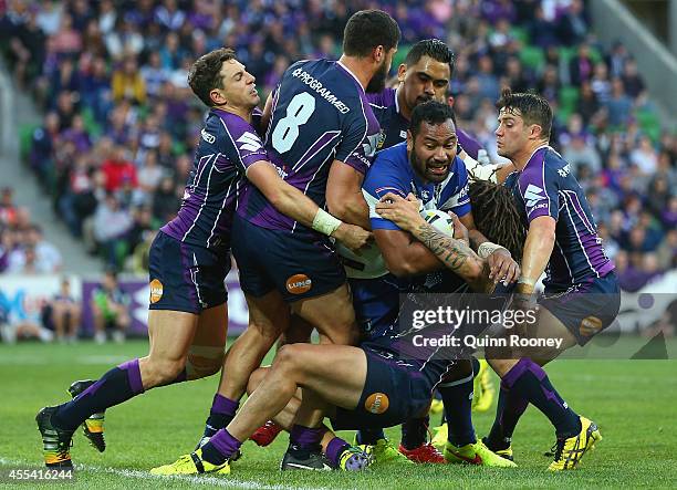 Tony Williams of the Bulldogs is tackled during the NRL 2nd Elimination Final match between the Melbourne Storm and the Canterbury Bankstown Bulldogs...