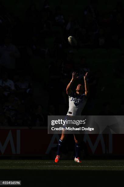 Mitch Brown of the Bulldogs catches the ball in the warm up during the NRL 2nd Elimination Final match between the Melbourne Storm and the Canterbury...