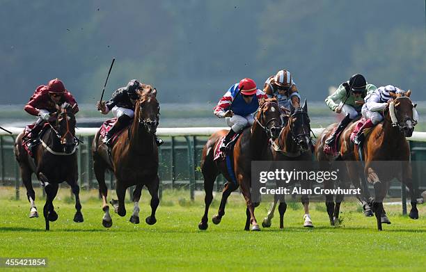 Frankie Dettori riding Mirza win The Qatar Prix Du Petit Couvert at Longchamp racecourse on September 14, 2014 in Paris, France.