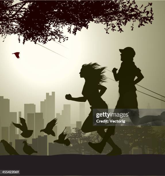 silhouette of two runners jogging in a city park - distance running stock illustrations