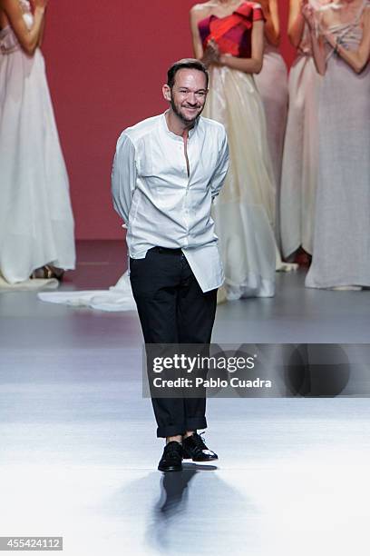 Spanish designer Ulises Merida walks the runway in the Ulises Merida show during Mercedes Benz Fashion Week Madrid Spring/Summer 2015 at Ifema on...