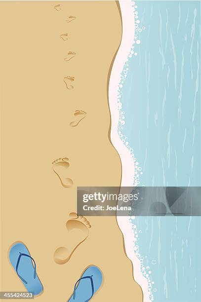 footprints am strand - sandig stock-grafiken, -clipart, -cartoons und -symbole