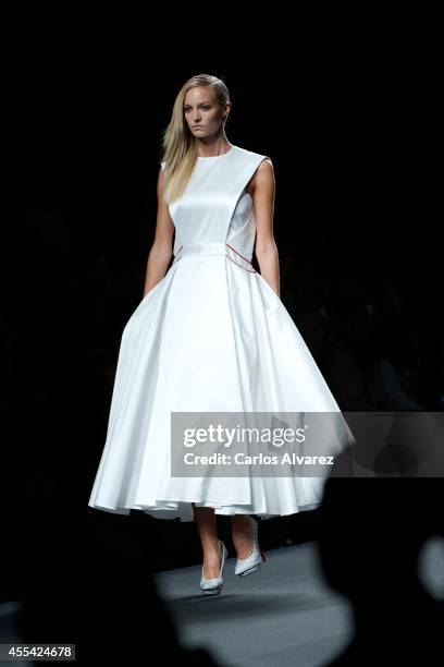 Model walks the runway in the Amaya Arzuaga fashion show during the Mercedes Benz Fashion Week Madrid Spring/Summer 2015 at Ifema on September 14,...