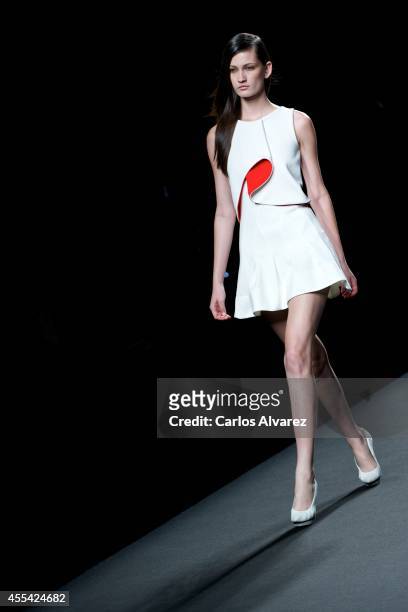Model walks the runway in the Amaya Arzuaga fashion show during the Mercedes Benz Fashion Week Madrid Spring/Summer 2015 at Ifema on September 14,...