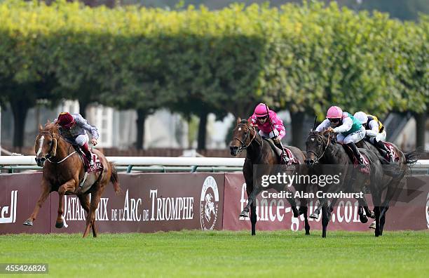 Frankie Dettori riding Ruler Of The World win The Qatar Prix Foy at Longchamp racecourse on September 14, 2014 in Paris, France.