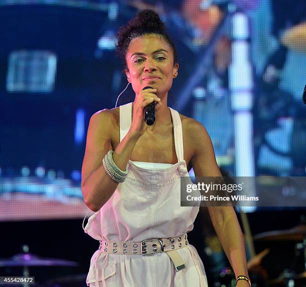 Amel Larrieux performs at ONE MusicFest at Aaron's Amphitheatre on September 13, 2014 in Atlanta, Georgia.