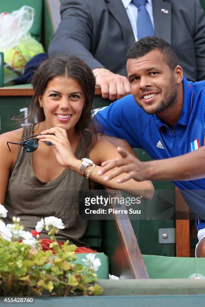 Jo-Wilfried Tsonga and his girlfriend Noura El Shwekh attend the Davis Cup - Semi-final France vs Czech Republic at Roland Garros on September 14,...