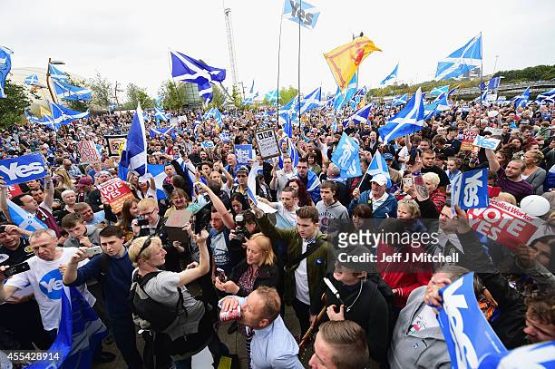 Pro independence supporters march through Glasgow on route to the BBC Scotland where they staged a protest against their perceived bias on September...