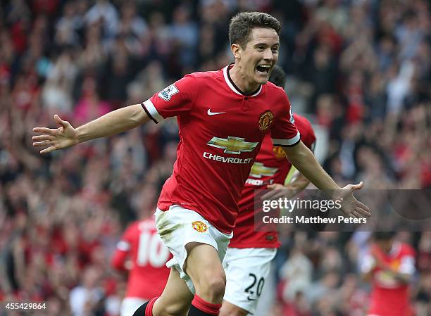 Ander Herrera of Manchester United celebrates scoring their second goal during the Barclays Premier League match between Manchester United and Queens...