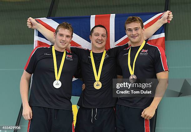 Luke Reeson of Great Britain , Michael Goody of Great Britain and Gus Hurst of Great Britain pose for photos with their medals after the Men's S10...