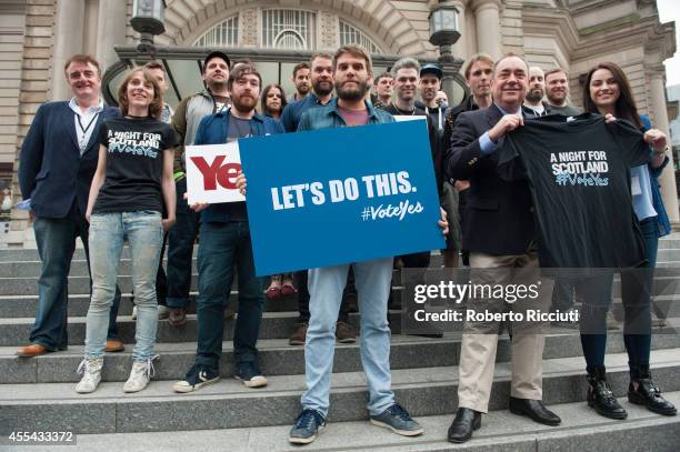 Tommy Sheppard, Billy Kennedy, Scott Hutchison, Grant Hutchison, Paul Thomson, Alex Kapranos, Alex Salmond and Amy MacDonald attend for a photocall...