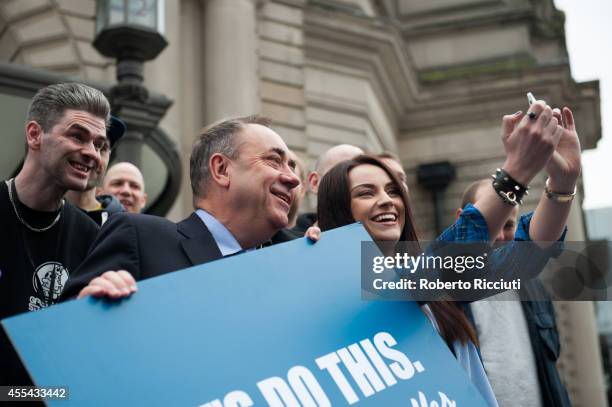 Paul Thomson, Alex Salmond and Amy MacDonald make a selfie during a photocall to present the event A Night For Scotland, a concert for 'Yes Scotland'...