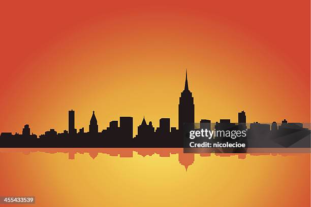 illustration of the new york city skyline at sunset - empire state building vector stock illustrations