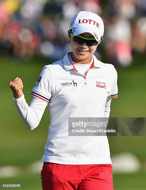 Hyo Joo Kim of South Korea celebrates holeing her winning putt on the 18th hole during the final round of The Evian Championship at the Evian Resort...