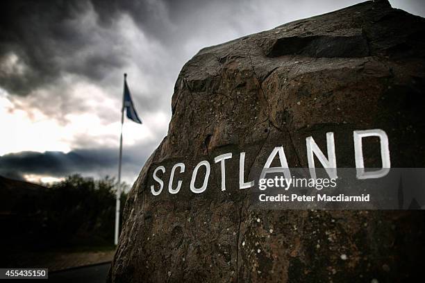 Scottish Saltire flag flies on the border with England on September 14, 2014 in Carter Bar, Scotland. The latest polls in Scotland's independence...