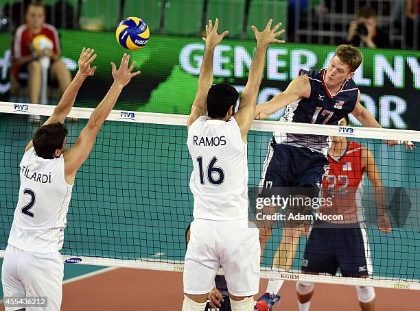 Maxwell Holt of the United States attacks during the FIVB World Championships match between Argentina and USA on September 14, 2014 in Bydgoszcz,...