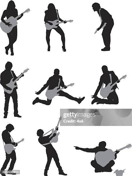 silhouette of musicians playing guitar - street musician stock illustrations
