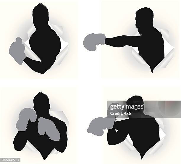 Paper Boxing Golves 30 Boxing Glove Punching Through Paper Stock Photos, High-Res Pictures ...