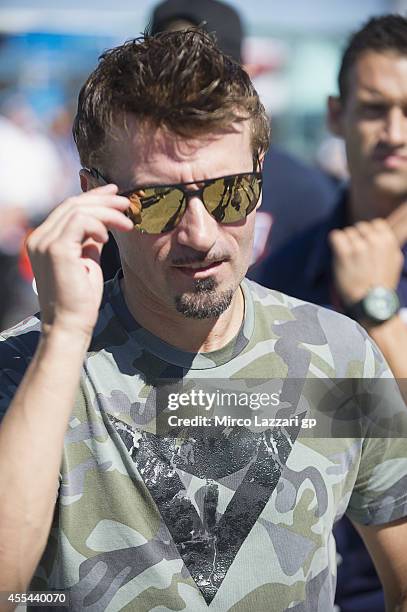 Max Biaggi of Italy looks on on the grid during the MotoGP race during the MotoGP of San Marino - Race at Misano World Circuit on September 14, 2014...