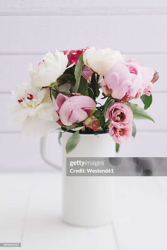 Bouquet of summer flowers on table, close up