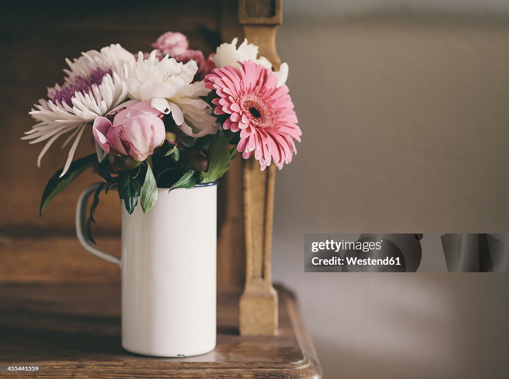 Bouquet of summer flowers on table, close up