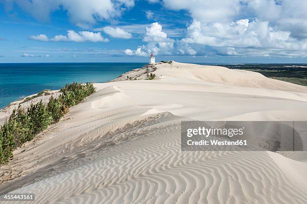 denmark, view of lighthouse near sea - jutland stockfoto's en -beelden
