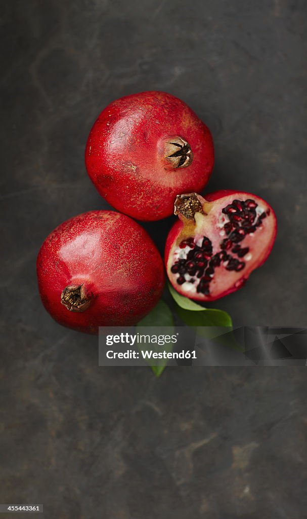 Pomegranates with leaf, close up