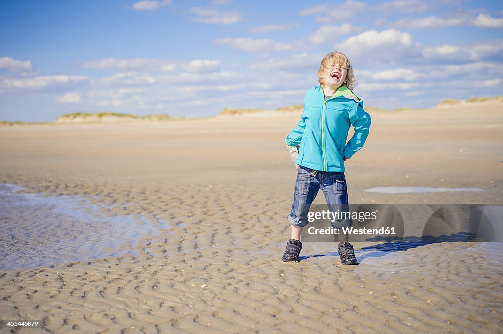Denmark, Romo, Boy crying at North Sea