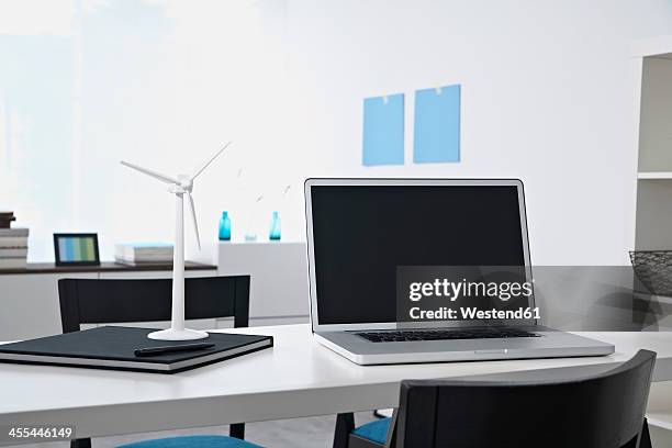 germany, north rhine westphalia, interior of home office - book on table stock pictures, royalty-free photos & images