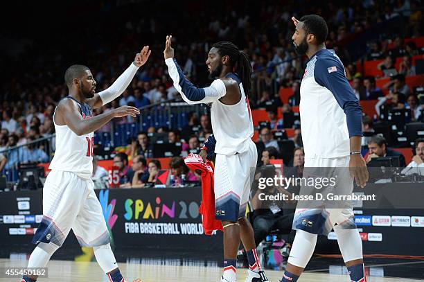 Kyrie Irving and Kenneth Faried of the USA Men's National Team celebrates against the Serbia National Team during the 2014 FIBA World Cup Finals at...