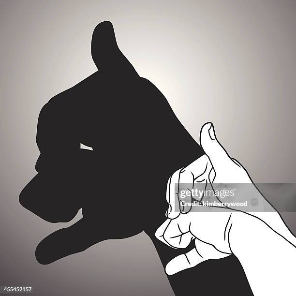 shadow puppet bulldog - shadow puppet stock illustrations