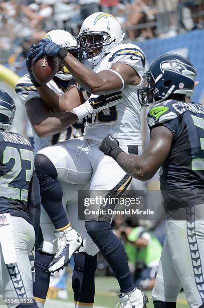 Tight end Antonio Gates of the San Diego Chargers celebrates after catching a touchdown pass against the Seattle Seahawks at Qualcomm Stadium on...