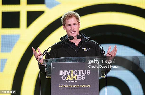 Prince Harry gives a speech at The Jaguar Land Rover Invictus Games Closing Concert at Olympic Park on September 14, 2014 in London, England.