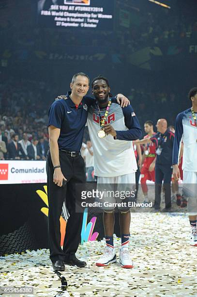 Assistant Coach Arturas Karnisovas and Kenneth Faried of the USA Men's National Team poses for a photo with the gold medals after defeating the...
