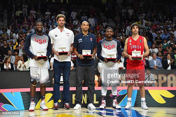 Kenneth Faried, Pau Gasol, Nicolas Batum, Kyrie Irving and Milos Teodosic poses for a photo as they are named the All-Tournament team in the 2014...