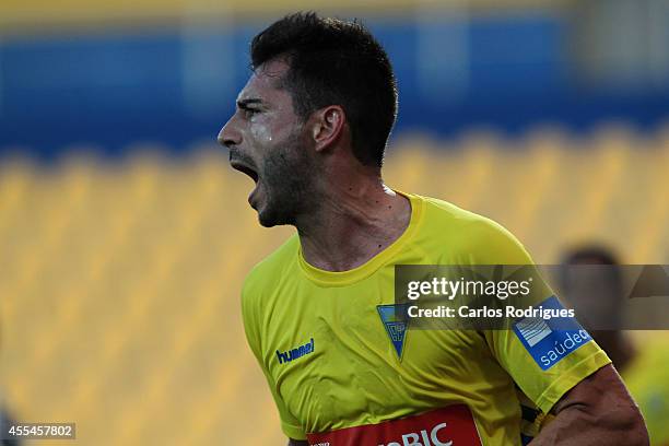 Estoril's defender Bruno Miguel celebrating Estoril's frist goal during the match between Estoril and Nacional at Estadio Antonio Coimbra da Mota on...