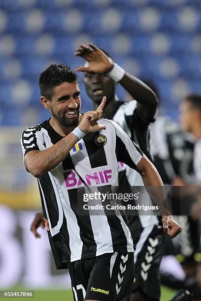 Nacional's forward Marco Matias celebrates scoring Nacional's first goal during the match between Estoril and Nacional at Estadio Antonio Coimbra da...