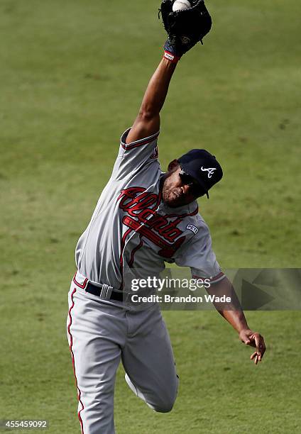 Left fielder Jose Constanza of the Atlanta Braves catches a fly-out hit by Leonys Martin of the Texas Rangers during the seventh inning of a baseball...