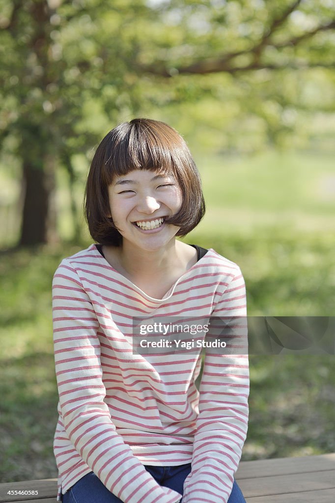 Smiling Woman in the green