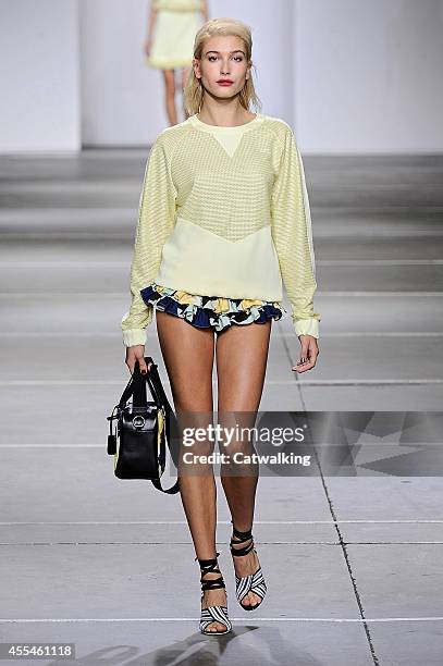 Model Hailey Baldwin walks the runway at the Topshop Unique Red Label Spring Summer 2015 fashion show during London Fashion Week on September 14,...