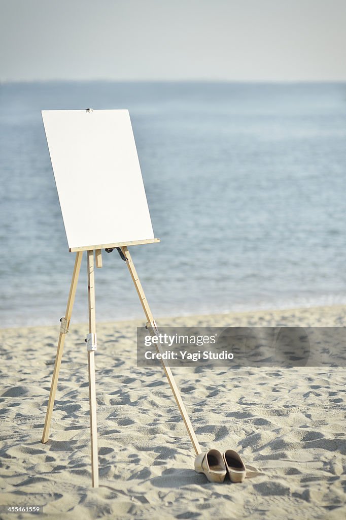Easel hung on a white canvas