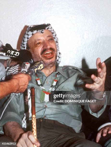Yasser Arafat, President of Palestine Liberation Organisation shown in a picture dated 30 Augutst 1982 in Beirut addresses the journalists before...