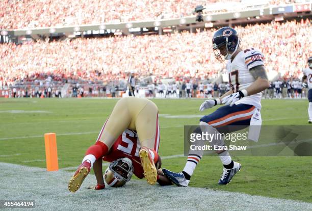 Wide receiver Michael Crabtree of the San Francisco 49ers catches a touchdown pass in the first quarter of a game against the Chicago Bears at Levi's...