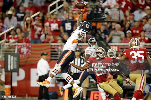 Wide receiver Brandon Marshall of the Chicago Bears catches a touchdown pass during the second quarter of a game against the San Francisco 49ers at...