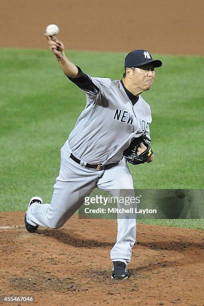 Hiroki Kuroda of the New York Yankees pitches in sixth inning during a baseball game against the Baltimore Orioles on September 14, 2014 at Oriole...